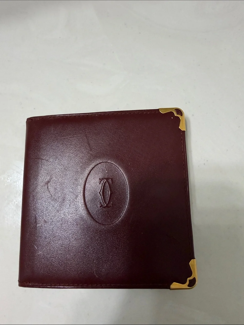 Cartier Burgundy Leather Card Holder with Gold Corner Accents
